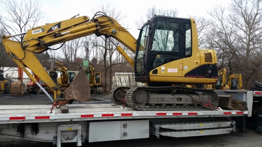 Transporting Caterpillar Midi 307C Excavator