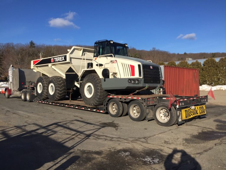 Terex Dump Truck on a trailer for transport. 