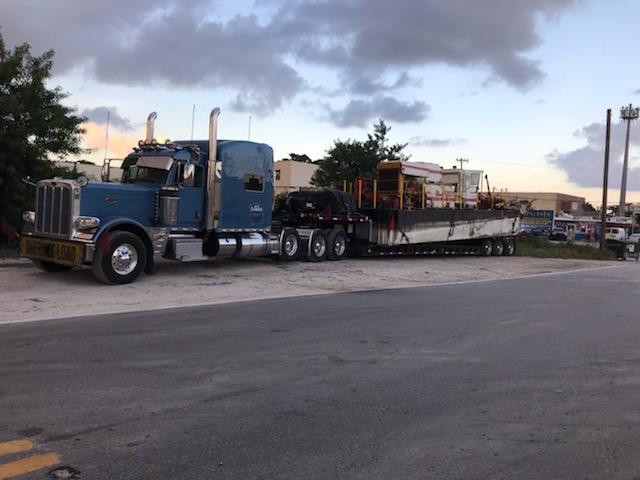 Dredging boat being hauled.