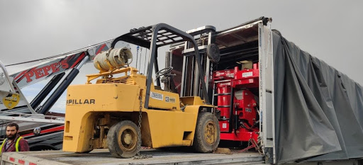 1999 Caterpillar Forklift on a Trailer