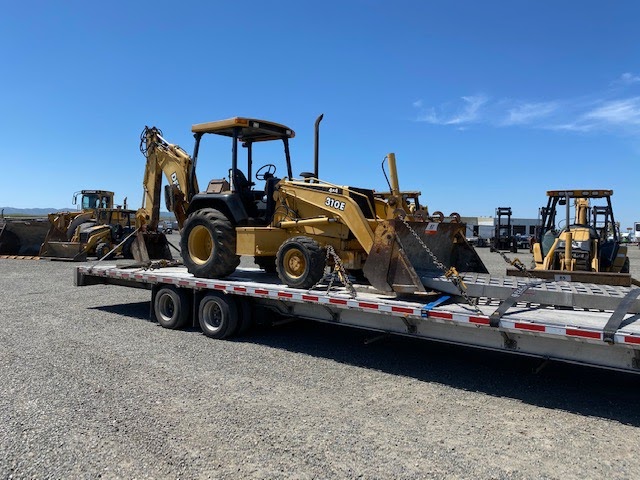 John Deere Backhoe on a Trailer