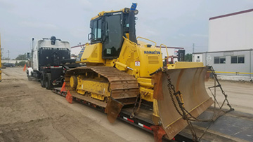 Shipping a Komatsu Dozer on a RGN trailer.