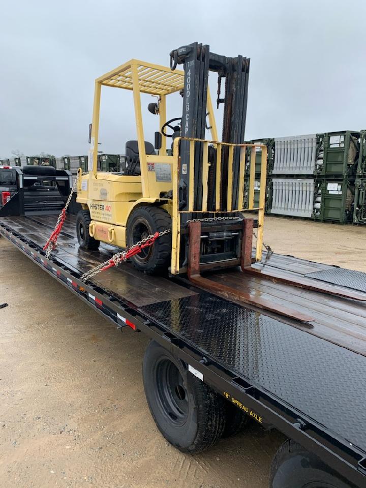 Transporting a Forklift on a Trailer.