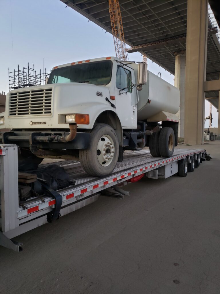 Portable water truck on a trailer.