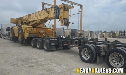 Shipping a 1996 Grove RT9100 on a beam trailer.