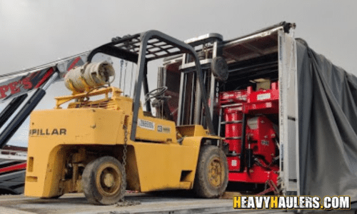 Case Study: Shipping a 1999 Caterpillar Forklift on a Conestoga Trailer