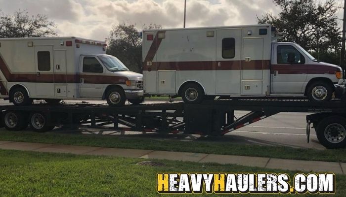 Hauling ambulances in Florida.