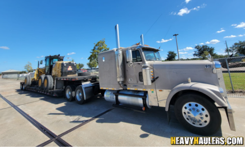 Transporting a Cat 120n2 Motor Grader